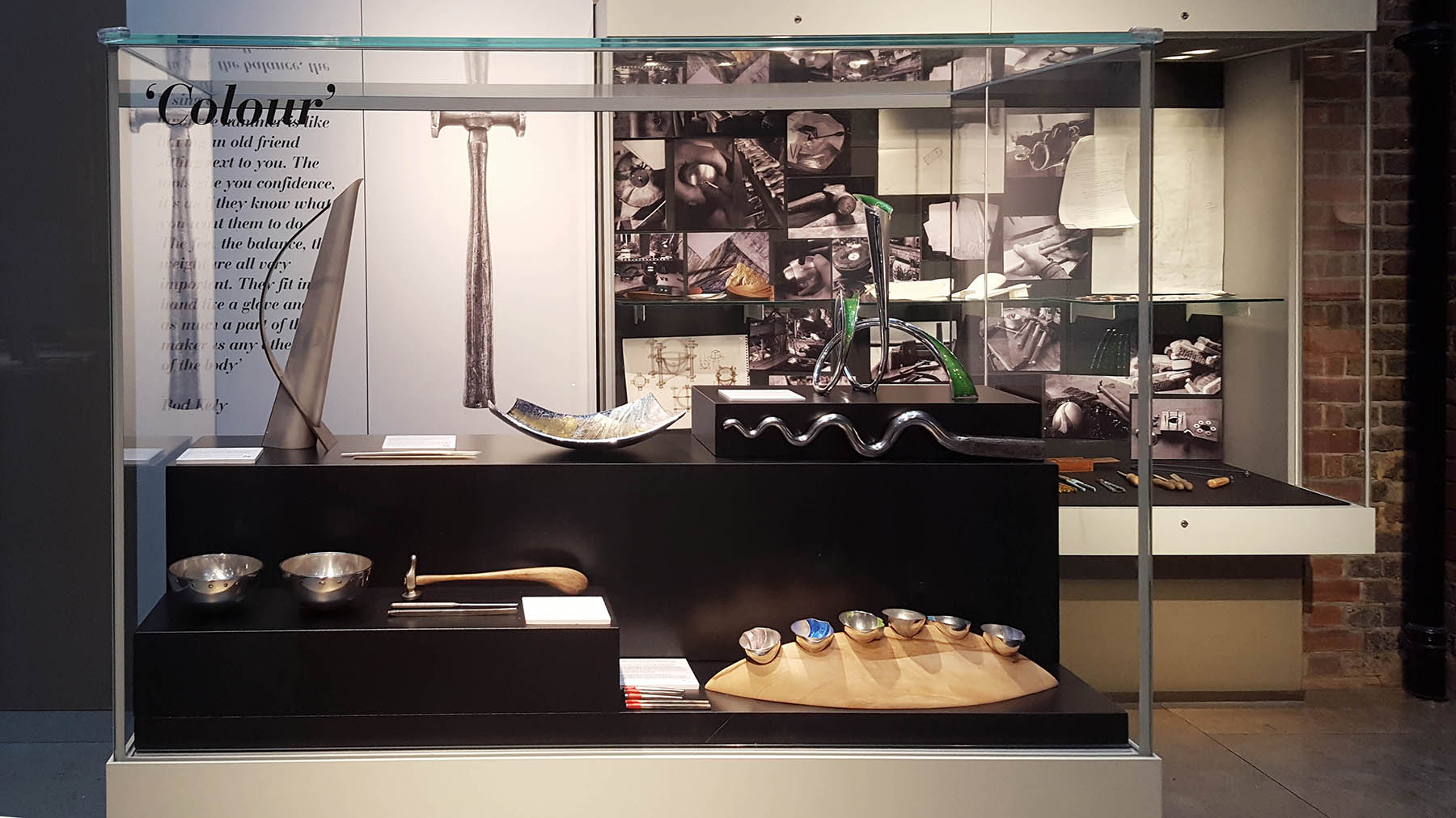 Silver Speaks Form Exhibition display case - silversmithing pieces using colour displayed with tools