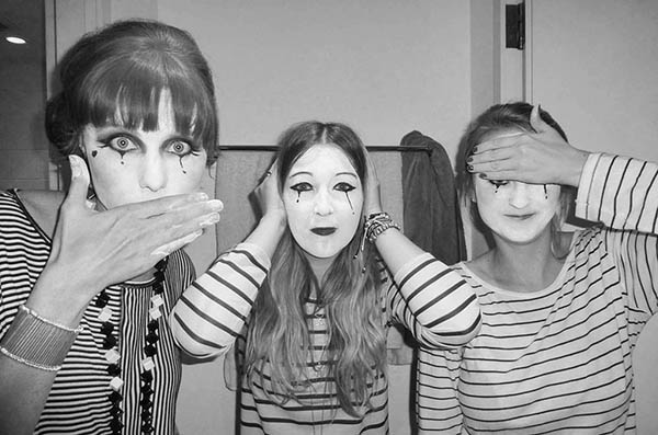 Three mime artists doing 3 Wise Monkeys