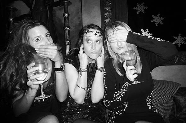 Three party girls doing 3 Wise Monkeys