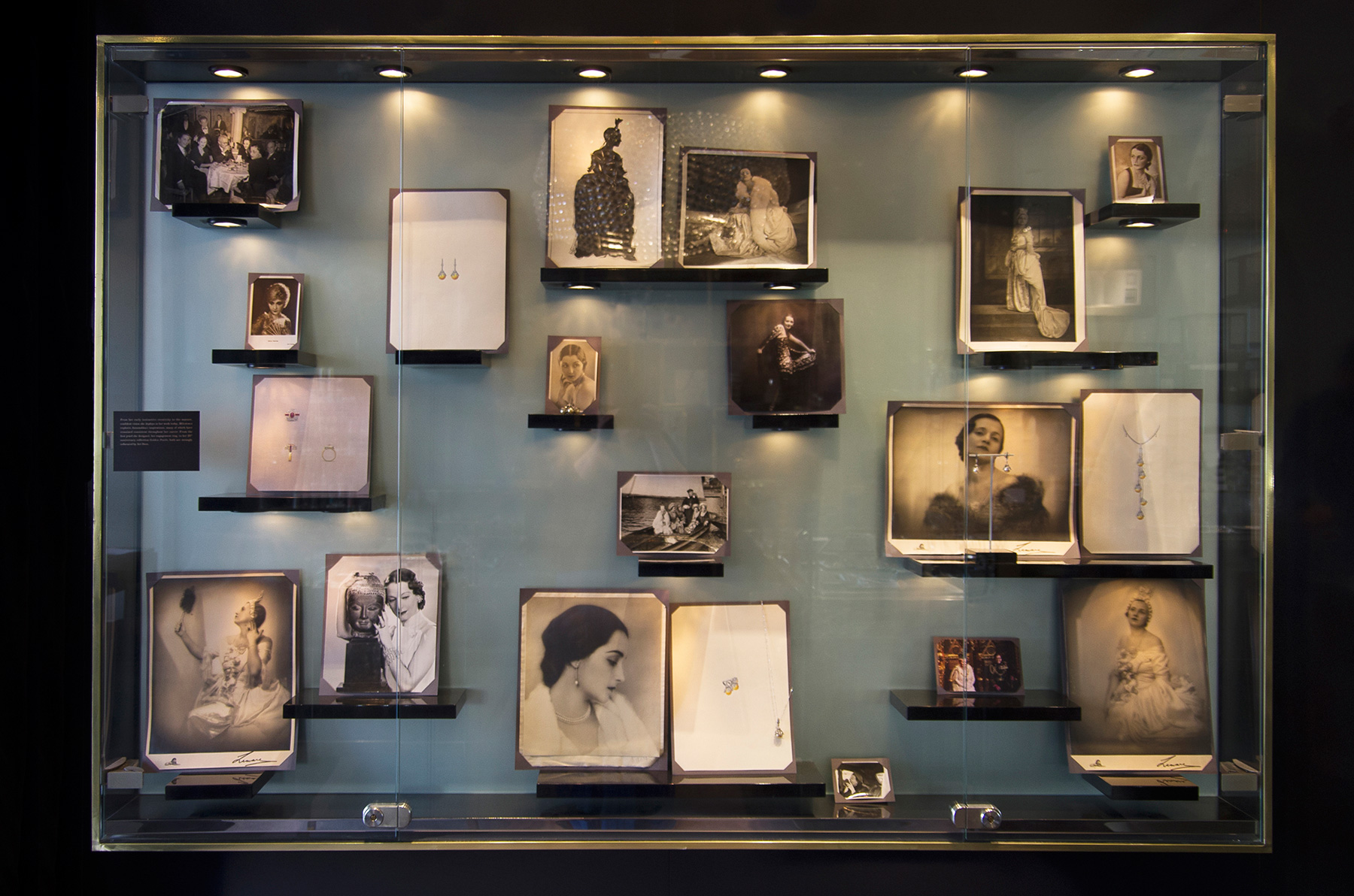 Annoushka Milestones Exhibition display cabinet - photos of 1920's glamourous women - Golden Pearls jewellery illustrations