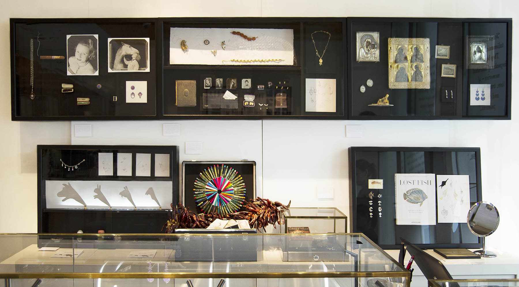 Annoushka Milestones Exhibition display cabinets with photos, jewellery, Russian Icons, pens, drawings
