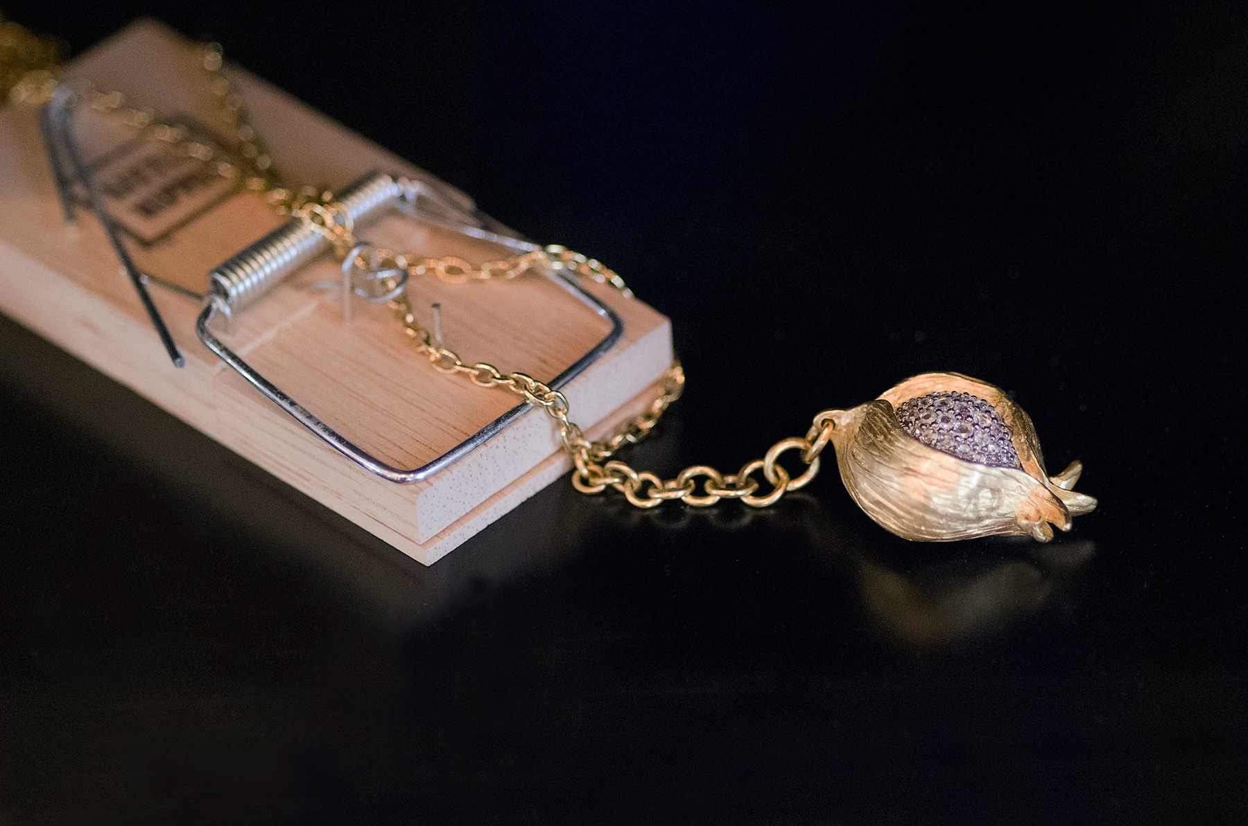 Annoushka Milestones Exhibition display cabinet - Mousetrap with Annoushka pomegranate pendant