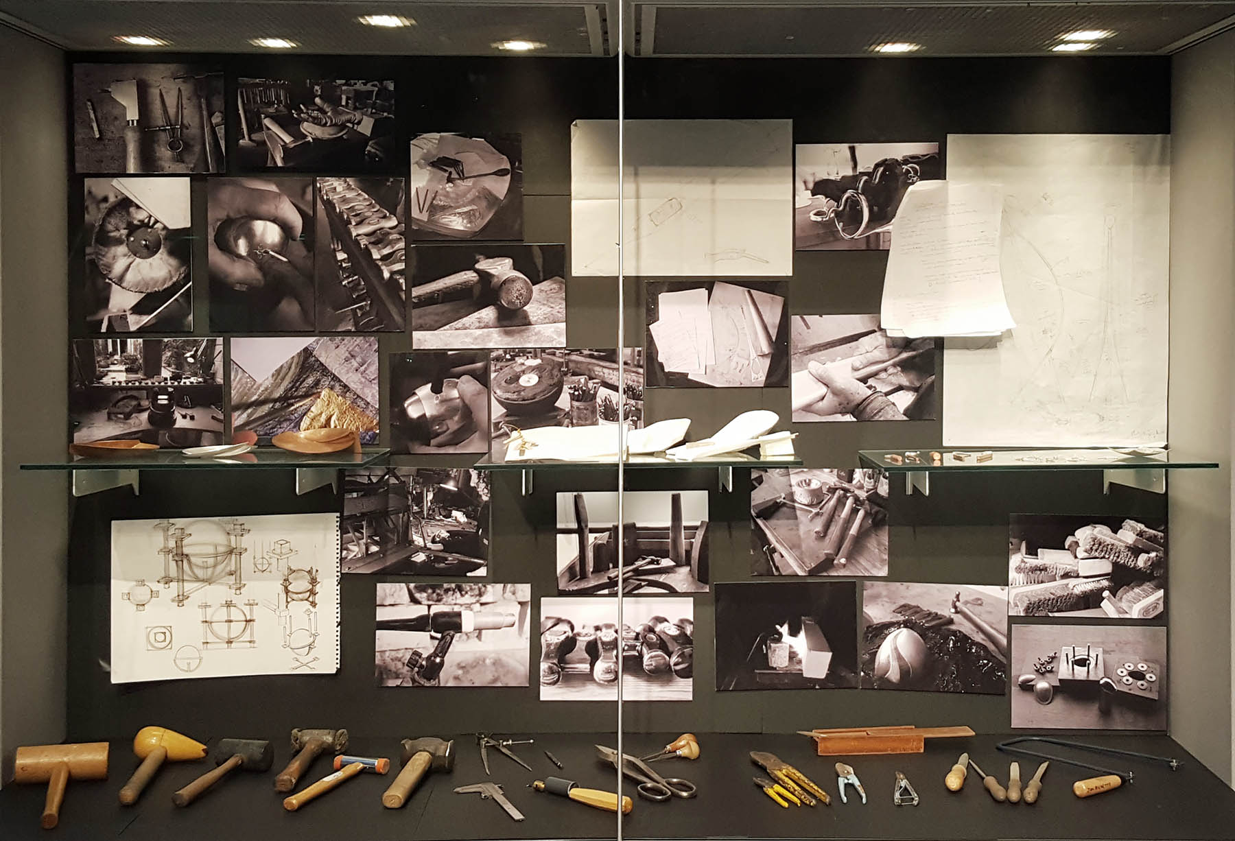 Silver Speaks Form Exhibition display case - Photos of tools and manufacturing process with technical drawings, maquettes, samples and silversmithing tools