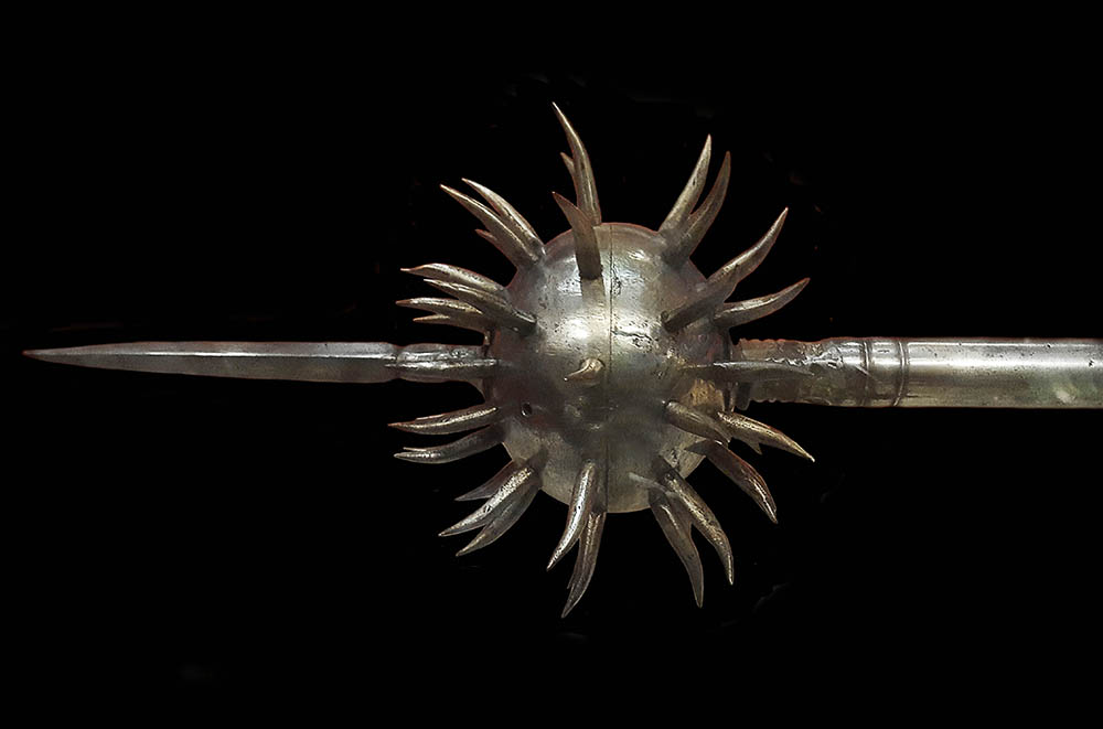 Metal spikey ball on spear weapon in Pitt Rivers Museum - machines and tools