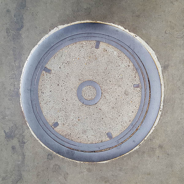Manhole Cover, London - Cast iron with concrete inner