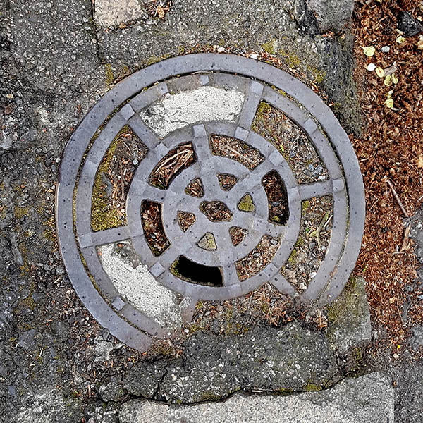 Manhole Cover, London - Cast iron wheel