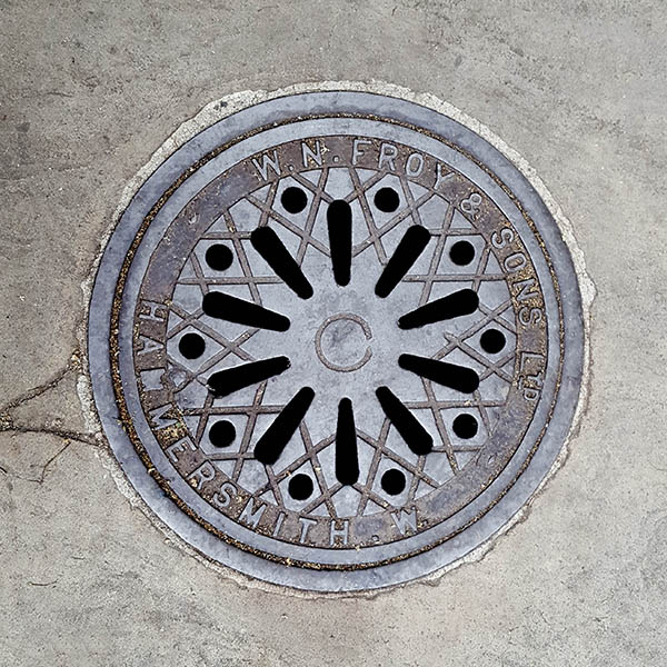 Manhole Cover, London - Cast iron decorative pattern and cut out