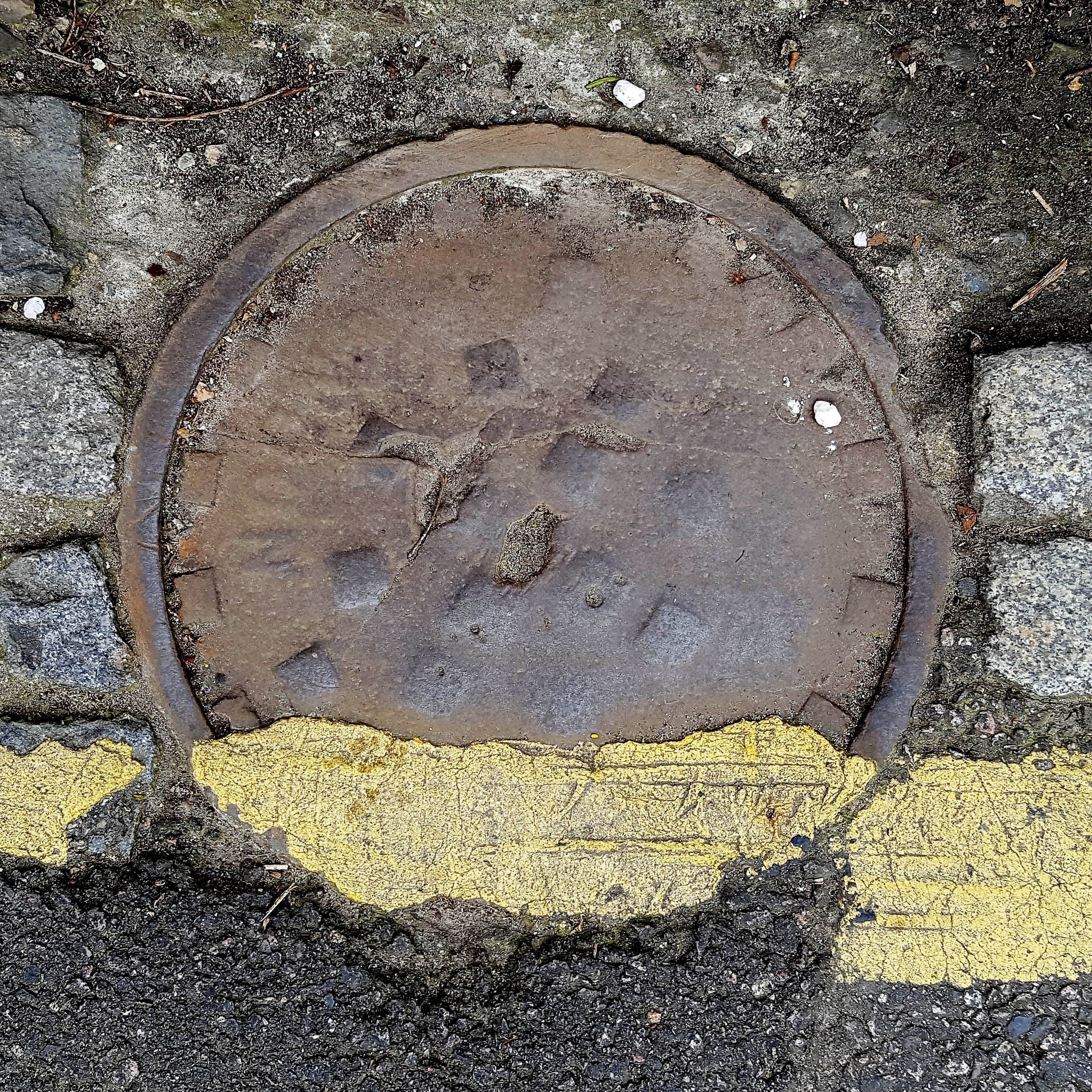 Manhole Cover, London - Cast iron with pattern of raised squares