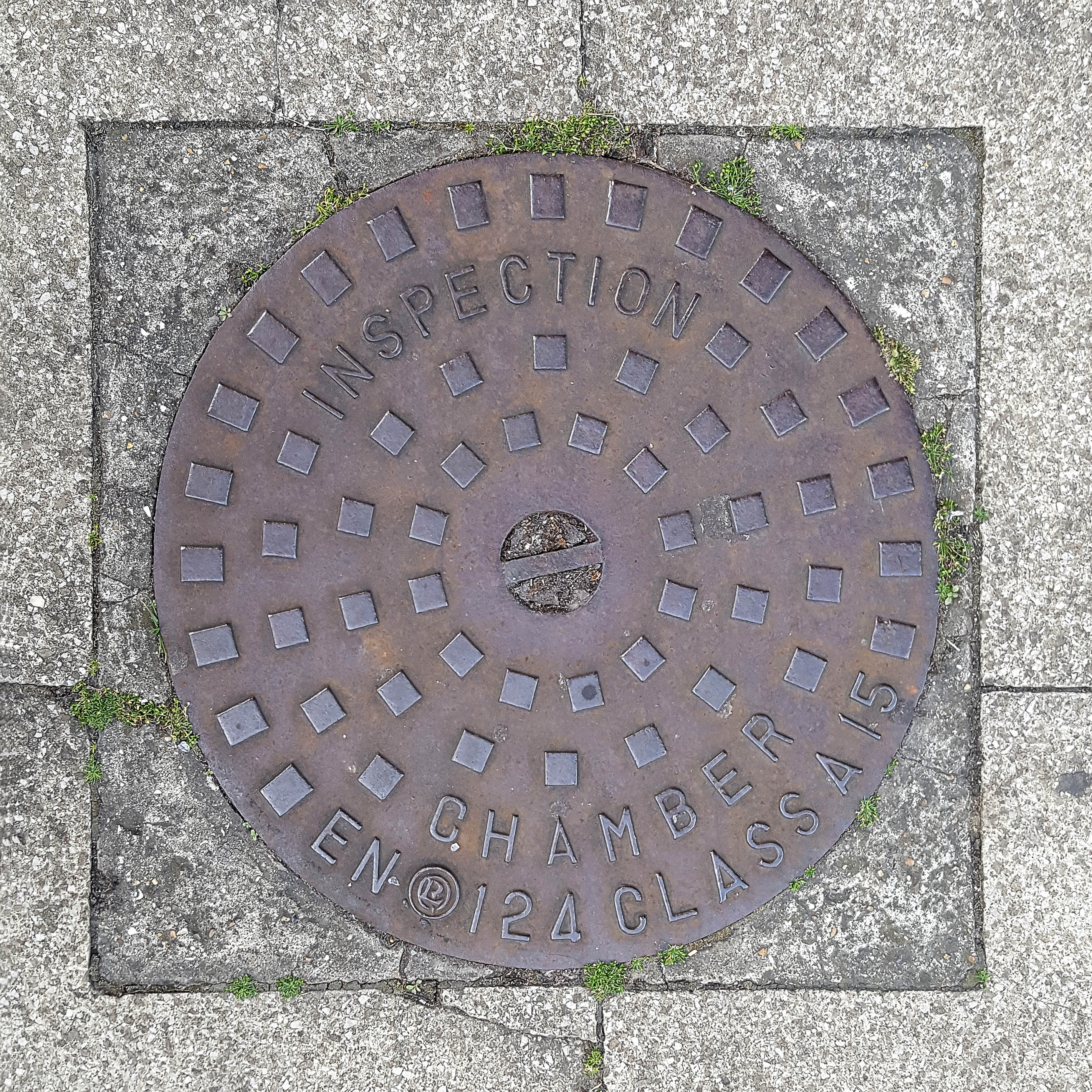Manhole Cover, London - Cast iron inscribed with Inspection Chamber ENO 124 Class A15 and a pattern of raised squares