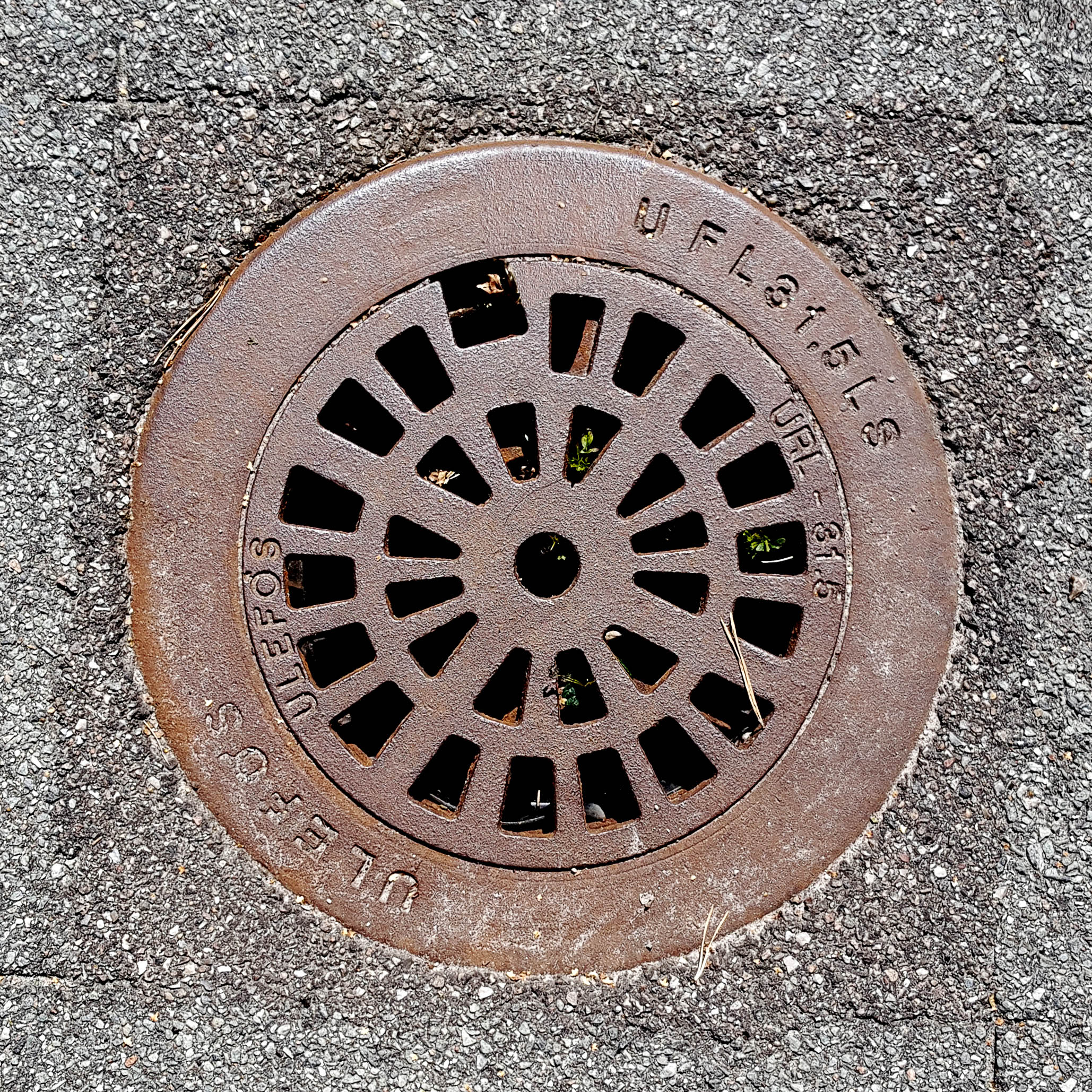 Manhole Cover, Frederiksvark Denmark - Cast iron surround inscribed with UFL31. 5LS ULEFOS - Inner, cut out circular pattern