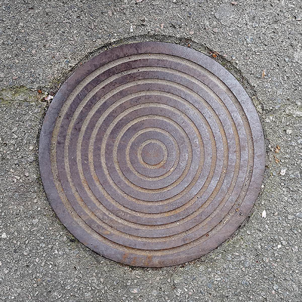 Manhole Cover, London - Cast iron with eight concentric circular grooves