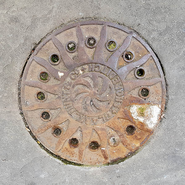 Manhole Cover, London - Cast iron with sunburst pattern