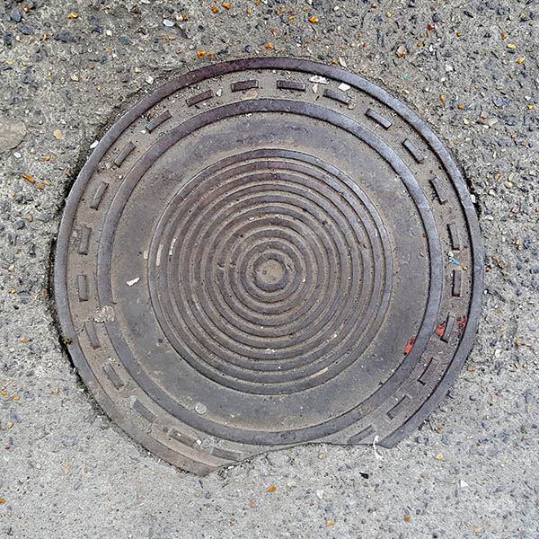 Manhole Cover, London - Cast iron with concentric circle pattern