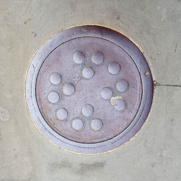 Manhole Cover, London - Cast iron with raised circle pattern