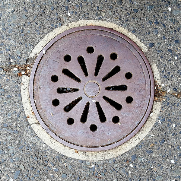 Manhole Cover, London - Cast iron with circular pattern