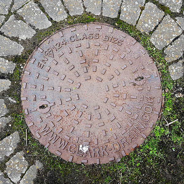 Manhole Cover, Essex - Cast iron with raised rectangle pattern, inscribed with EN 124 CLASS B-125 WWW.CLARK-DRAIN.COM