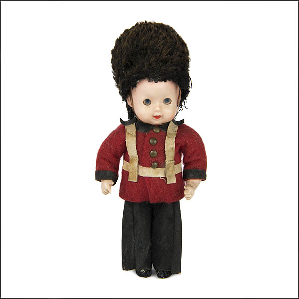 Vintage hard plastic souvenir queen's guard doll