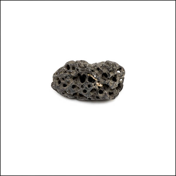 Pebble - uneven shape, warm grey, pitted eroded