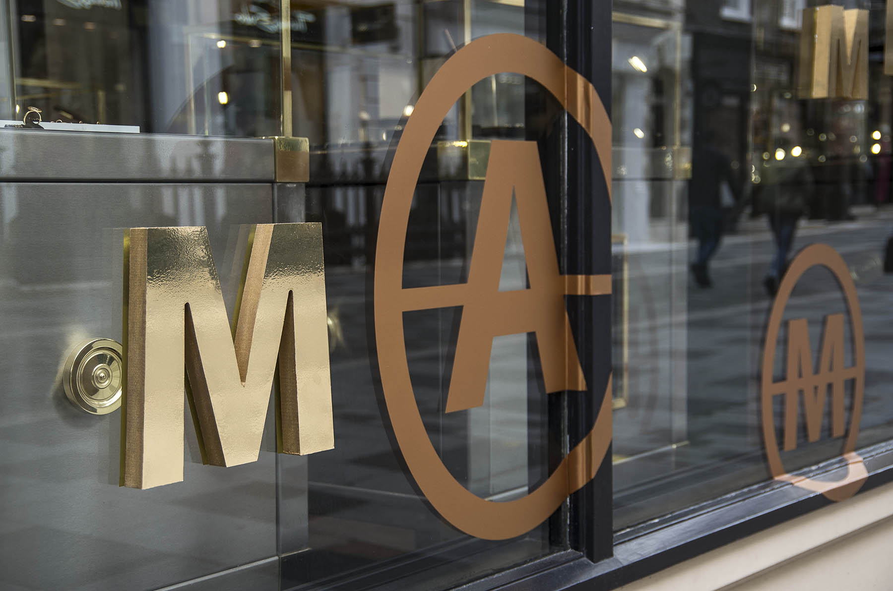 Annoushka Initials window display - gold and copper letters